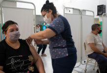 Empleados vacunados contra el Covid-19 podrán ser llamados para volver a trabajar presencialmente